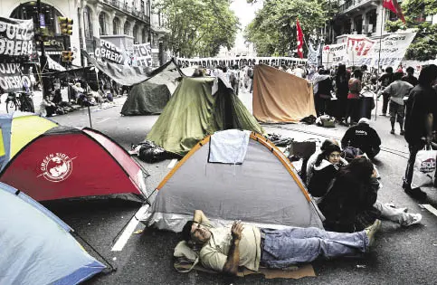 A photo of tents in the street in Argentina, part of a protest